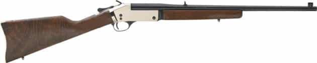 Sleek bolt-action rifle with black barrel and elegant wooden stock for precision shooting.