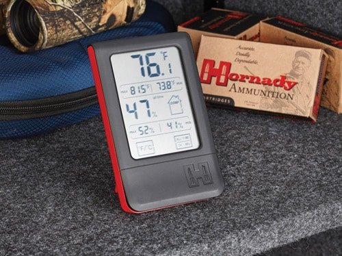 Sleek outdoor temperature and humidity monitor for camping and hunting activities.