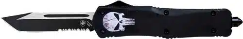 Durable tactical knife with skull design, tanto tip, and serrated edge for versatile cutting.