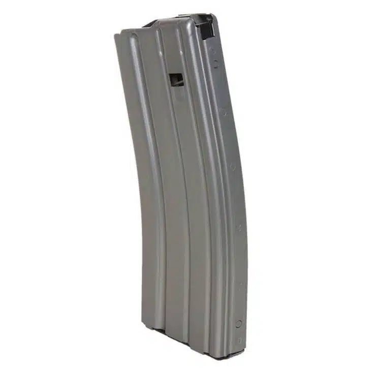 Curved metal firearm magazine for reliable feeding and enhanced performance in rifles.