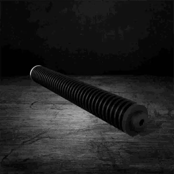 Durable black cylindrical grip component with grooves for mechanical and construction applications.