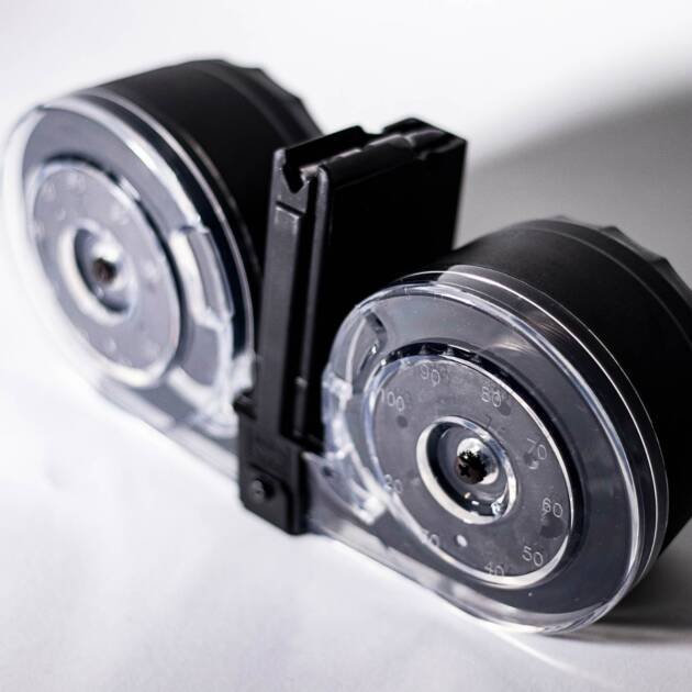 Modern transparent cassette tape with circular spools, blending retro style and contemporary audio design.