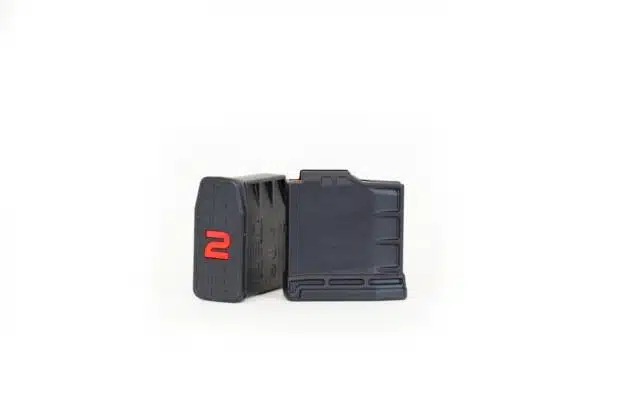 Durable black plastic tool with red number 2, designed for versatile functionality and ease of use.